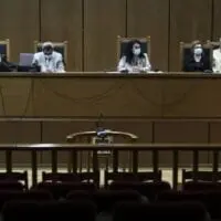 Δίκη Χρυσής Αυγής: Ενοχοι για οπλοκατοχή Μιχαλολιάκος, Κασιδιάρης και Μίχος