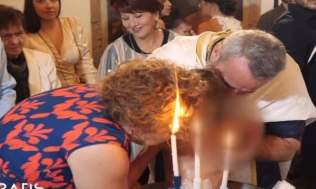 Περιστατικό σε βάπτιση: Πήραν φωτιά τα μαλλιά της νονάς! (βίντεο)